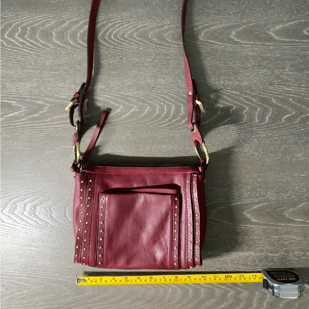 orYany Maroon Pebbled Leather Studded Crossbody - Picture 11 of 12